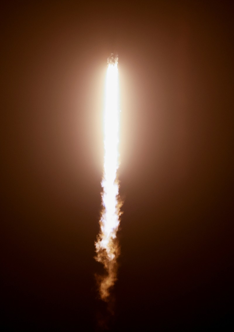 NASA astronauts Kjell Lindgren, Robert Hines, and European Space Agency astronaut Samantha Cristoforetti of Italy depart their crew quarters for their launch on a SpaceX Falcon 9 rocket to begin a six-month expedition on the International Space Station, at Cape Canaveral, Florida, U.S. April 27, 2022. REUTERS/Steve Nesius
