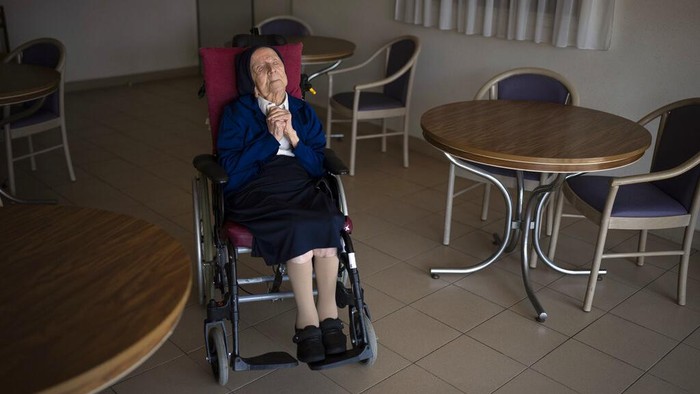Sister Andre poses for a portrait at the Sainte Catherine Laboure care home in Toulon, southern France, Wednesday, April 27, 2022. With the death of Kane Tanaka at age 119, the world's oldest human is now Lucile Randon, a French nun known as Sister Andre, aged 118, according to the The Gerontology Research Group. (AP Photo/Daniel Cole)