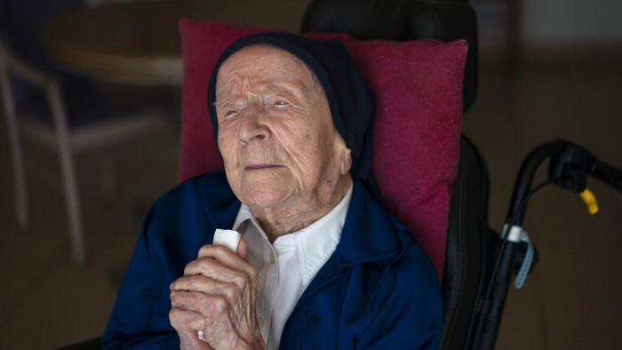 Sister Andre poses for a portrait at the Sainte Catherine Laboure care home in Toulon, southern France, Wednesday, April 27, 2022. With the death of Kane Tanaka at age 119, the worlds oldest human is now Lucile Randon, a French nun known as Sister Andre, aged 118, according to the The Gerontology Research Group. (AP Photo/Daniel Cole)
