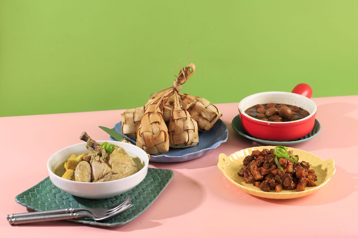 Ketupat Sayur typical Lebaran, served with Opor Ayam, Semur Telur Puyuh, and Sambal Goreng Ati Kentang. Special dishes during Eid al-Fitr and Eid al-Adha, especially in Indonesia.