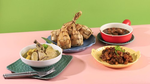 Ketupat Sayur typical Lebaran, served with Opor Ayam, Semur Telur Puyuh, and Sambal Goreng Ati Kentang. Special dishes during Eid al-Fitr and Eid al-Adha, especially in Indonesia.
