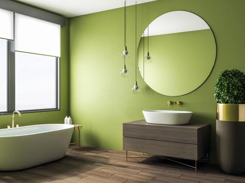 Clean green bathroom interior with appliances and decorative pot tree. Design and real estate concept. 3D Rendering