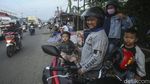 Ragam Ekspresi Anak-anak Saat Mudik Pakai Motor