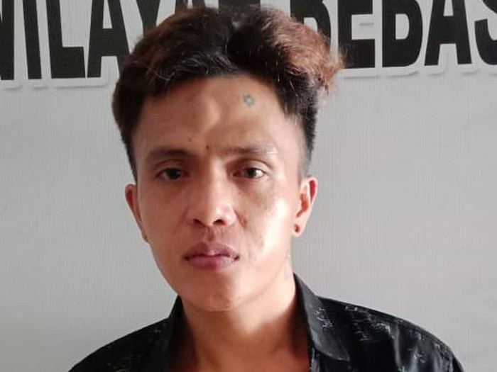 Tampang pelaku pembunuhan sadis yang tarik keluar jantung waria di Minahasa (Dok. Istimewa)