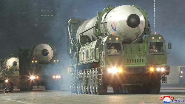 Hwasong-17 intercontinental ballistic missiles take part in a nighttime military parade to mark the 90th anniversary of the founding of the Korean People's Revolutionary Army in Pyongyang, North Korea, April 26. KCNA via REUTERS