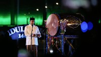 Gubernur DKI Jakarta Anies Baswedan memberikan sambutan pada acara Festival Tabuh Bedug Malam Takbiran di Jakarta International Stadium (JIS), Jakarta, Minggu (1/5/2022).