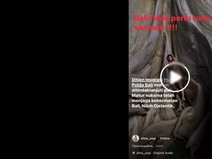 Viral! Bule Perempuan Bugil Berpose di Pohon Tua Kawasan Pura