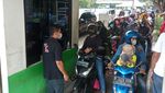 Potret Libur Lebaran Keluarga Naik Pikap hingga Angkot ke TMII
