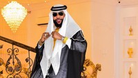 E-Money mengucapkan selamat Idul Fitri pada caption unggahannya.