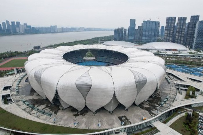 This aerial photo taken on April 1, 2022 shows the Hangzhou Olympic Sports Centre Stadium, main stadium of the 19th Asian Games, in Hangzhou in Chinas eastern Zhejiang province. (Photo by AFP) / China OUT