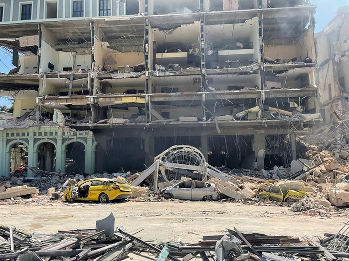 Debris is scattered after an explosion destroyed the Hotel Saratoga, in Havana, Cuba May 6, 2022. REUTERS/Alexandre Meneghini
