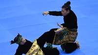 Riska dan Ririn menang dari pesilat Filipina Jeremae Beato dan Mitz Jude dengan skor akhir 9.930-9.900.