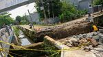 Jalan Amblas Gegara Banjir di Puri Pamulang Tangsel Masih Diperbaiki