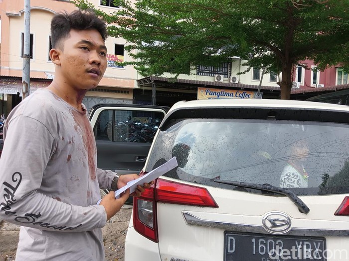 Mahasiswa Universitas Medan Area Abdul Latief saat membuat laporan ke SPKT Polrestabes Medan.
