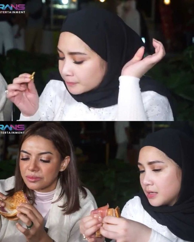 Penampilan Gigi menjadi sorotan warganet karena ia mengenakan hijab pashmina instan warna hitam dipadu dengan kemeja putih. Gigi terlihat memesona saat memakai hijab. Foto: Dok. Youtube Rans Entertaiment.