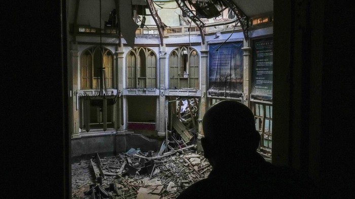 Church administrator Alejandro Clemente Gonzalez poses for a photo inside the Calvary Baptist Church damaged by an explosion that devastated the Hotel Saratoga which is located next door, in Old Havana, Cuba, Wednesday, May 11, 2022. Gonzalez was talking with an electrician while preparing for weekend services inside the church when the May 6 explosion shook the building and shattered the 19th century dome towering far above the pews. “I didnt know what was happening,