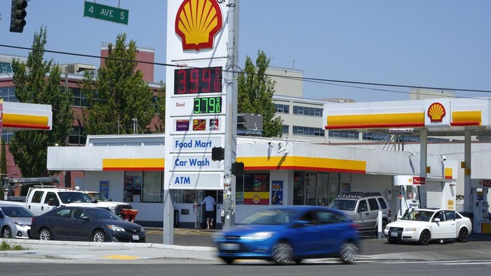 Traffic moves past a Shell gas station, Tuesday, June 29, 2021, near downtown Seattle. (AP Photo/Ted S. Warren)