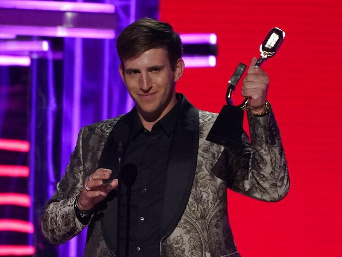 Illenium accepts the award for top dance electronic album for Fallen Embers at the Billboard Music Awards on Sunday, May 15, 2022, at the MGM Grand Garden Arena in Las Vegas. (AP Photo/Chris Pizzello)