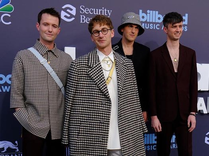 British rock band Glass Animals (Dave Bayley, Joe Seaward, Ed Irwin-Singer and Drew MacFarlane) attend the 2022 Billboard Music Awards at the MGM Grand Garden Arena in Las Vegas, Nevada, May 15, 2022. (Photo by Maria Alejandra CARDONA / AFP) (Photo by MARIA ALEJANDRA CARDONA/AFP via Getty Images)