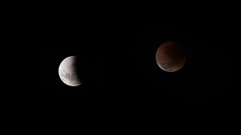 Sementara itu, gerhana Bulan total dapat juga berwarna merah kusam hingga kecoklatan, apabila kualitas di lokasi pengamatan bersih dari debu. (Photo by Joao Gabriel Alves/AGIF via REUTERS).