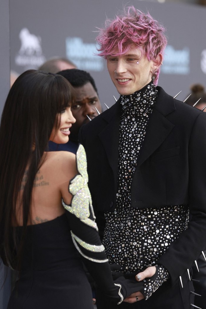US-2022-BILLBOARD-MUSIC-AWARDS-ARRIVALS LAS VEGAS, NEVADA - MAY 15: Megan Fox and Machine Gun Kelly attend the 2022 Billboard Music Awards at MGM Grand Garden Arena on May 15, 2022 in Las Vegas, Nevada. Frazer Harrison/Getty Images/AFP (Photo by Frazer Harrison / GETTY IMAGES NORTH AMERICA / Getty Images via AFP)