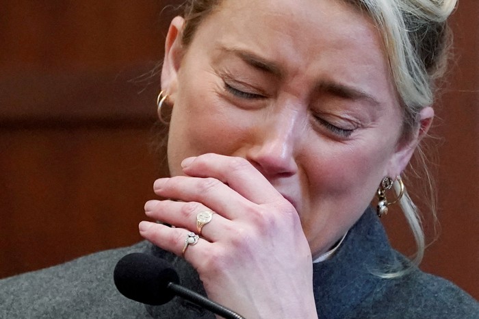 Amber Heard Actor Amber Heard testifies in the courtroom at the Fairfax County Circuit Courthouse in Fairfax, Va., Monday, May 16, 2022. Steve Helber/Pool via REUTERS