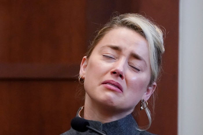 Actor Amber Heard testifies in the courtroom at the Fairfax County Circuit Courthouse in Fairfax, Va., Monday, May 16, 2022.  Steve Helber/Pool via REUTERS
