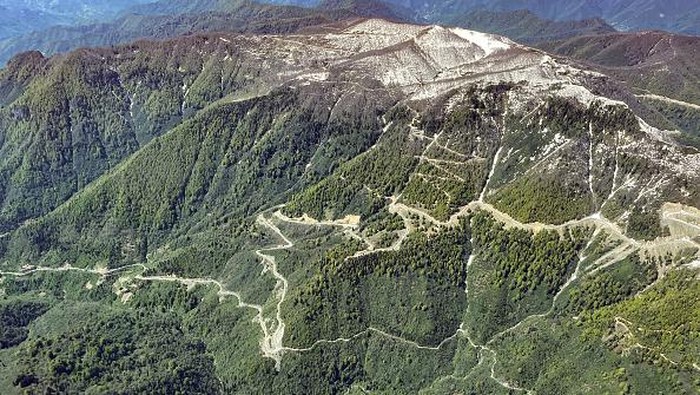 ERZURUM, TURKIYE - MAY 18: An aerial view of winding roads of in the steep mountains of the Eastern Black Sea region in Erzurum, located near the border lines of Artvin, Turkiye on May 18, 2022. The roads opened as a result of hard work in wooded and rocky areas in Savsat, Borcka and Hopa districts of Artvin reveal the difficulty of transportation in the mountainous lands of the region. (Photo by Huseyin Yildiz/Anadolu Agency via Getty Images)