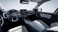 Untuk bagian dasboard, terdapat kluster instrumen digital dengan layar sentuh infotainment berukuran 12 inci. Fitur lainnya termasuk tampilan head-up, sistem audio premium, pencahayaan ambient, kursi dengan pemanas, dan panoramic sunroof. Foto: BAIC