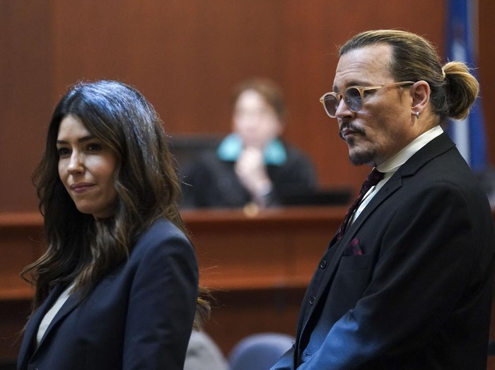US Attorney Camille Vasquez (C) arrives during the $50 million Depp vs Heard defamation trial at the Fairfax County Circuit Court in Fairfax, Virginia, on April 12, 2022. (Photo by Brendan Smialowski / POOL / AFP) (Photo by BRENDAN SMIALOWSKI/POOL/AFP via Getty Images)