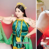 Clarissa menjawab pertanyaan para netizen tentang proses pengambilan gambar dengan mengunggah behind the scenes. Wanita itu terlihat memang menyiapkannya secara maksimal. Ia bahkan mengikat lengannya dengan selotip agar terlihat lebih kecil ketika adegan menari.Foto: Instagram @clarissaputri