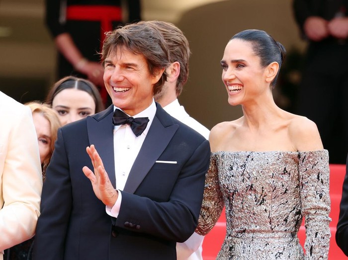 CANNES, FRANCE - MAY 18: Tom Cruise and Jennifer Connelly attends the screening of Top Gun: Maverick during the 75th annual Cannes film festival at Palais des Festivals on May 18, 2022 in Cannes, France. (Photo by Daniele Venturelli/WireImage)