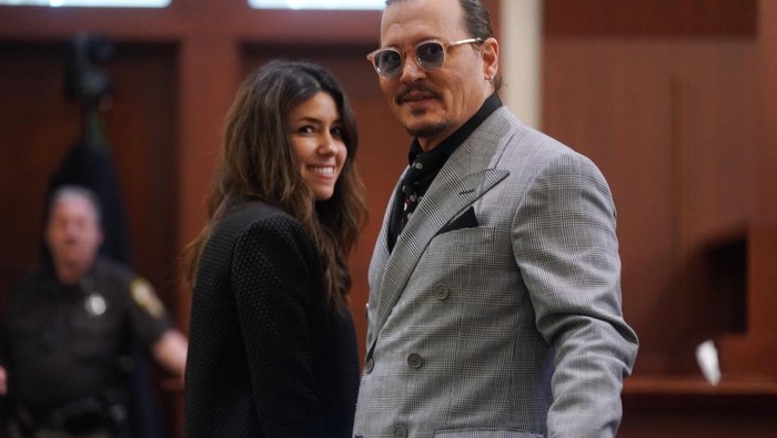 US Attorney Camille Vasquez (C) arrives during the $50 million Depp vs Heard defamation trial at the Fairfax County Circuit Court in Fairfax, Virginia, on April 12, 2022. (Photo by Brendan Smialowski / POOL / AFP) (Photo by BRENDAN SMIALOWSKI/POOL/AFP via Getty Images)