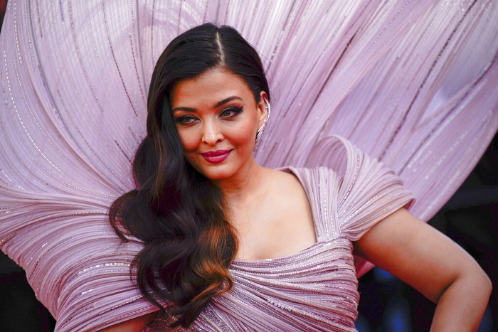 Aishwarya Rai poses for photographers upon arrival at the premiere of the film 'Armageddon Time' at the 75th international film festival, Cannes, southern France, Thursday, May 19, 2022. (AP Photo/Daniel Cole)