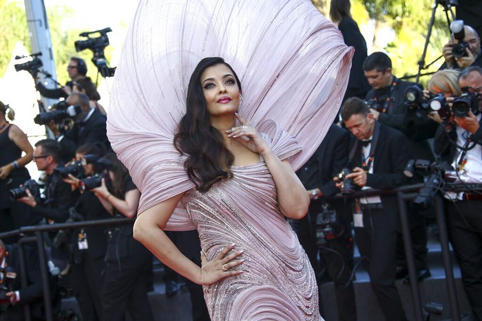 Aishwarya Rai poses for photographers upon arrival at the premiere of the film 'Armageddon Time' at the 75th international film festival, Cannes, southern France, Thursday, May 19, 2022. (Photo by Joel C Ryan/Invision/AP)