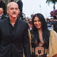 Anggun C. Sasmi berkesempatan menghadiri pemutaran perdana film Top Gun: Maverick yang digelar di Cannes Film Festival 2022, Cannes, Prancis, baru-baru ini. Penyanyi asal Indonesia yang kini berdomisili di Prancis itu datang bersama suaminya, Christian Kretschmar. (Foto: Stephane Cardinale-Corbis via Getty Images)