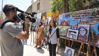 Jurnalis senior Al Jazeera berdarah Palestina-Amerika Serikat, Shireen Abu Aqleh telah berkarir lebih dari 25 tahun sebagai jurnalis. Jaafar Ashtiyeh/AFP via Getty Images