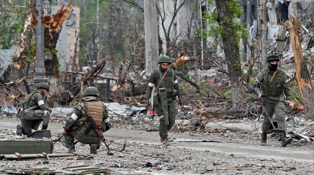Russian service members work on demining the territory of Azovstal steel plant during Ukraine-Russia conflict in the southern port city of Mariupol, Ukraine May 22, 2022. REUTERS/Alexander Ermochenko