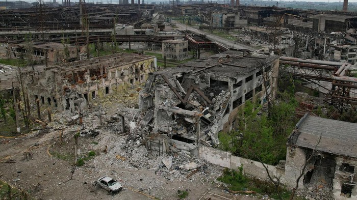 Russian service members work on demining the territory of Azovstal steel plant during Ukraine-Russia conflict in the southern port city of Mariupol, Ukraine May 22, 2022. REUTERS/Alexander Ermochenko