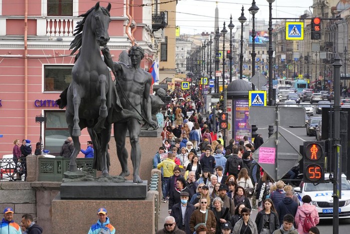 Russia Daily Life People walk down the Nevsky prospect, the central avenue of St. Petersburg, Russia, Monday, May 23, 2022. (AP Photo)