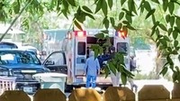 Dalam gambar yang diperoleh dari potongan video terlihat ambulans berada di sekitar lokasi penembakan maut di kawasan Texas, Amerika Serikat, Selasa (24/5/2022). (Video obtained by Reuters/via REUTERS).  