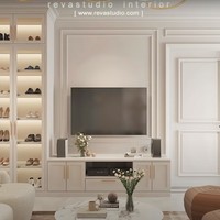 Di lantai 2 rumahnya nantinya juga akan ada ruang tamuu yang didominasi oleh warna putih dan coklat. Di samping televisi terdapat lemari kaca yang bisa digunakan untuk menyimpan sepatu atau barang-barang milik Raffi dan Nagita. Foto: YouTube/Rans Entertainment