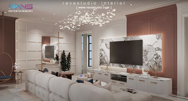 Kalau ini adalah desain ruang tengah di lantai bawah rumah baru milik Raffi Ahmad dan Nagita Slavina. Dengan perpaduan warna putih, coklat, dan sedikit sentuhan warna abu-abu, ruang tengah tersebut tampak elegan dan nyaman. Foto: YouTube/Rans Entertainment