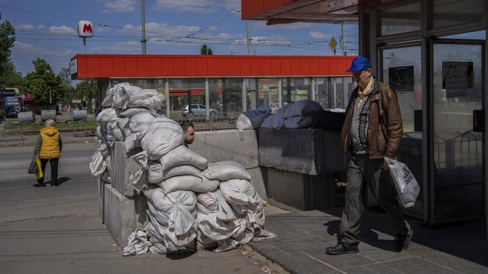 Residents live in a subway station still used as temporary shelter in Kharkiv, eastern Ukraine, Tuesday, May 24, 2022. Kharkiv subway resumed service on Tuesday morning after it was closed for more than two months during Russian attempt to capture the city. (AP Photo/Bernat Armangue)