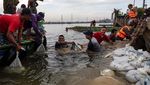 Ribuan Karung Pasir Tambal Tanggul Jebol di Tanjung Emas, Ini Fotonya