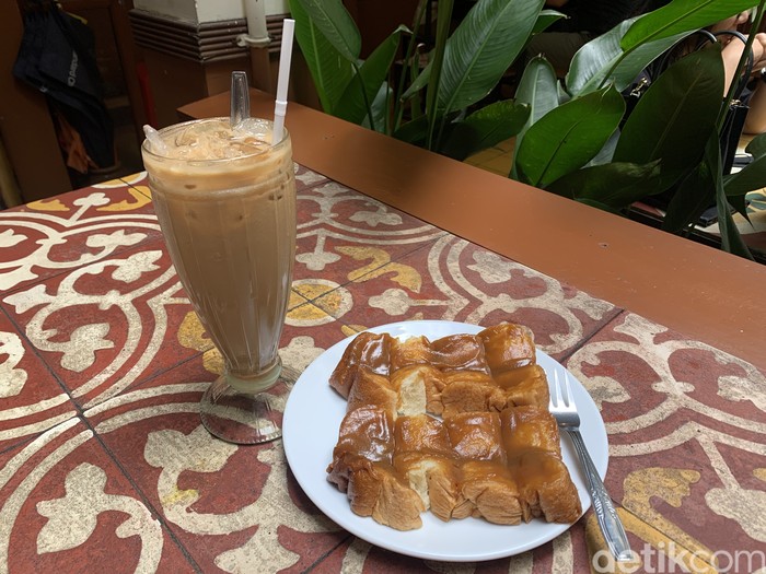Warung Kopi Purnama.