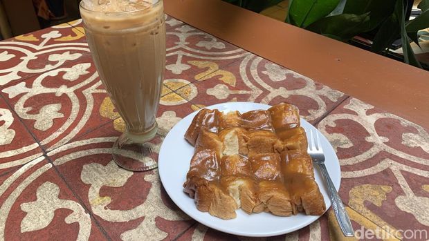 Warung Kopi Purnama.