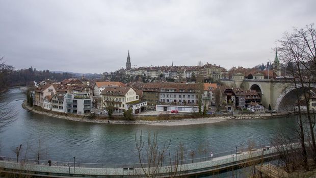 BERN, SWITZERLAND - JANUARY 01 : Panoramic view of  The old town the medieval city center of Bern and the Aare River on January 01, 2019 in Bern, Switzerland. The old town is the medieval city center of Bern. Bern is the capital city of Switzerland, is built around the Aare River.  Its origins back to the 12th century, with medieval architecture preserved in the Old Town. It is a UNESCO Cultural World Heritage Site since 1983 due to the compact and generally intact medieval core. (Photo by Athanasios Gioumpasis/Getty Images)