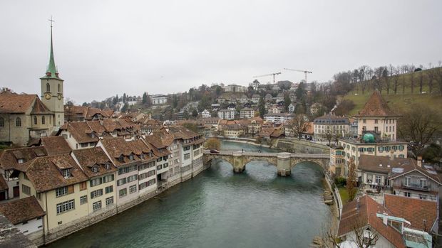 BERN, SWITZERLAND - JANUARY 01 : Panoramic view of  The old town the medieval city center of Bern and the Aare River on January 01, 2019 in Bern, Switzerland. The old town is the medieval city center of Bern. Bern is the capital city of Switzerland, is built around the Aare River.  Its origins back to the 12th century, with medieval architecture preserved in the Old Town. It is a UNESCO Cultural World Heritage Site since 1983 due to the compact and generally intact medieval core. (Photo by Athanasios Gioumpasis/Getty Images)