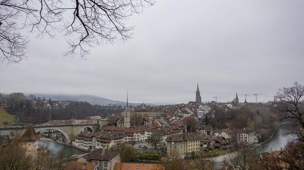 BERN, SWITZERLAND - JANUARY 01 : Panoramic view of  The old town the medieval city center of Bern and the Aare River on January 01, 2019 in Bern, Switzerland. The old town is the medieval city center of Bern. Bern is the capital city of Switzerland, is built around the Aare River.  Its origins back to the 12th century, with medieval architecture preserved in the Old Town. It is a UNESCO Cultural World Heritage Site since 1983 due to the compact and generally intact medieval core. (Photo by Athanasios Gioumpasis/Getty Images)